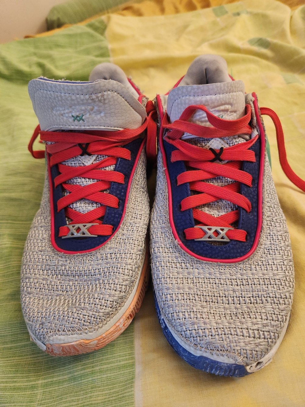 Nike Gray Knit Athletic Sneakers with Blue and Red Accents